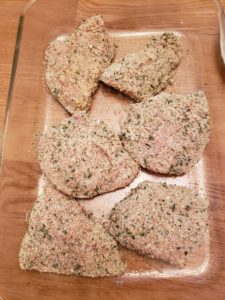 chicken in baking pan ready to cook