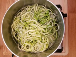 zoodles in pot of water