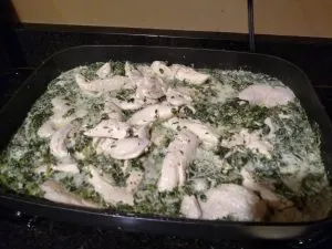 skillet chicken Florentine simmering in skillet